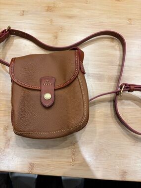 Dooney & Bourke Brown Crossbody with Pink Trim Leather Saddle